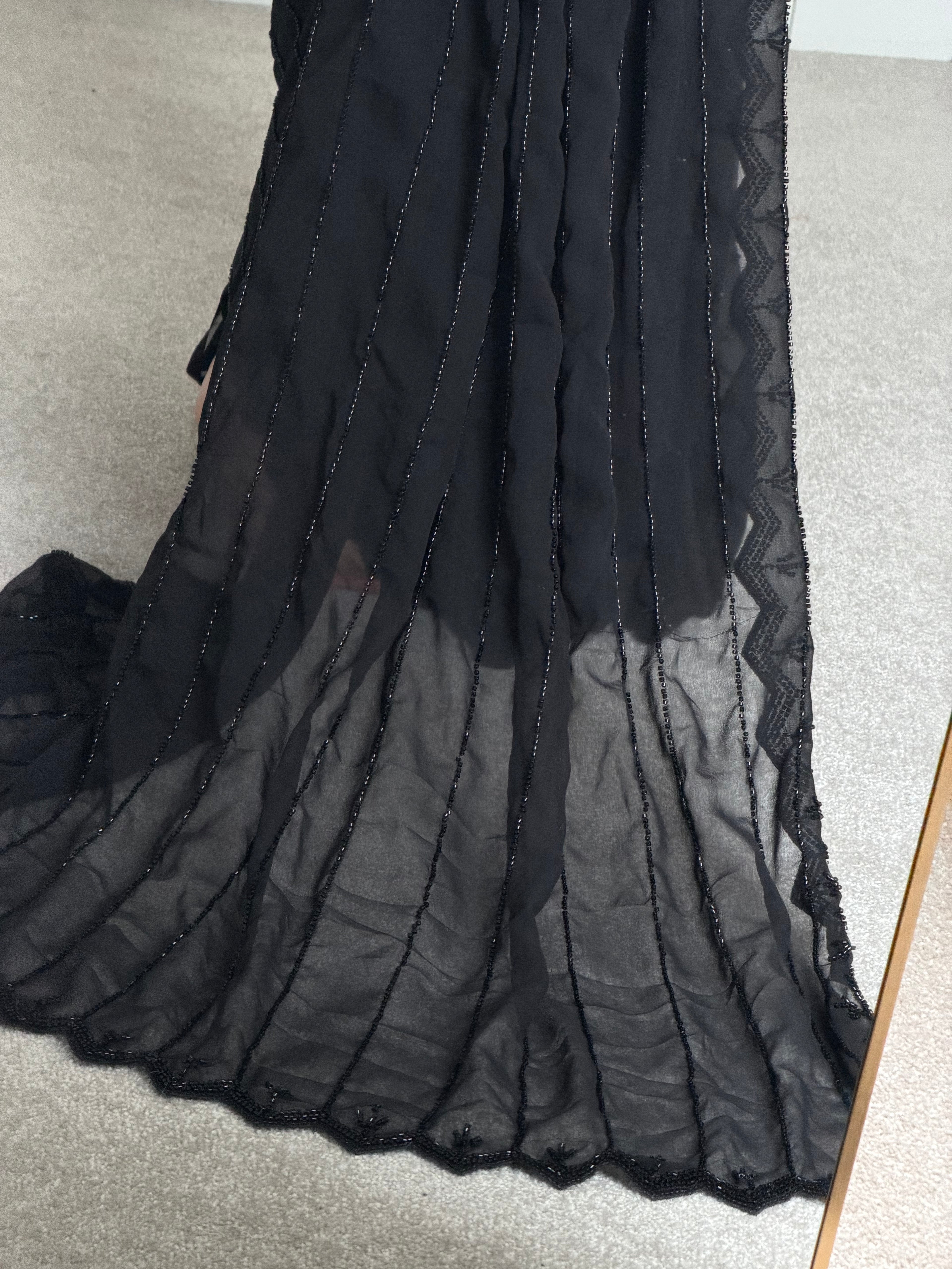 Sitara-Serving elegance in every bead Saree